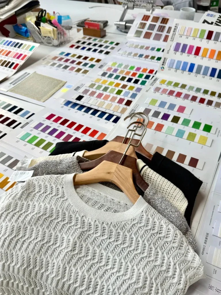 Knitwear sampling process for 26SS fashion collection in professional factory