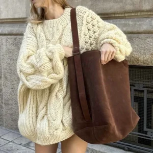 Manufacturer of hand-woven crochet floral knit cardigans