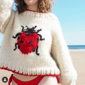 Manufacturer of hand-woven crochet floral knit cardigans