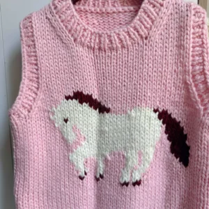 Manufacturer of hand-woven crochet floral knit cardigans